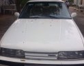 Mazda 323 1989 - Cần bán Mazda 323 đời 1989, màu trắng xe gia đình, 65 triệu