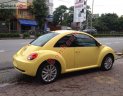 Volkswagen New Beetle 2.0AT 2009 - Bán Volkswagen New Beetle 2.0AT đời 2009, màu vàng, xe nhập, giá tốt