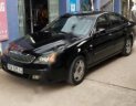Daewoo Magnus 2004 - Cần bán lại xe Daewoo Magnus 2004, màu đen, nhập khẩu nguyên chiếc, giá 200tr