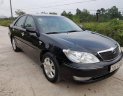 Toyota Camry 3.0AT 2005 - Bán Toyota Camry 3.0AT đời 2005, màu đen số tự động