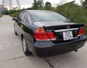 Toyota Camry 3.0AT 2005 - Bán Toyota Camry 3.0AT đời 2005, màu đen số tự động