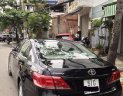 Toyota Camry 2.4G 2011 - Cần bán gấp Toyota Camry 2.4G sản xuất 2011, màu đen chính chủ