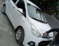 Hyundai i10   2014 - Bán xe Hyundai i10 sản xuất 2014, màu trắng