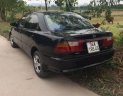 Mazda 323 MT 2000 - Bán Mazda 323 MT đời 2000, màu đen, xe nhập số sàn, 115 triệu
