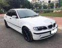 BMW 3 Series 318i 2005 - Cần bán xe BMW 3 Series 318i năm 2005, màu trắng xe gia đình