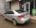 Kia Forte SLI 2009 - Cần bán gấp Kia Forte SLI năm sản xuất 2009, màu bạc ít sử dụng, giá tốt