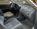 Ford Laser 2001 - Bán Ford Laser sản xuất 2001, màu vàng