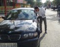 BMW 3 Series 318i 2005 - Bán ô tô BMW 3 Series 318i sản xuất 2005, màu đen số tự động, 310 triệu