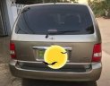 Kia Carnival 2009 - Bán Kia Carnival 2009, màu vàng  