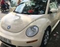 Volkswagen New Beetle 2009 - Bán Volkswagen New Beetle đời 2009, màu kem (be), nhập khẩu nguyên chiếc số tự động
