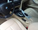 BMW 3 Series  320i  2014 - Chính chủ bán xe BMW 3 Series 320i sản xuất 2014, màu đen