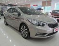 Kia K3 1.6MT 2015 - Cần bán Kia K3 1.6MT năm sản xuất 2015, màu trắng giá cạnh tranh