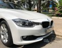 BMW 3 Series 328i 2012 - Cần bán BMW 3 Series 328i đời 2012, màu trắng, xe nhập