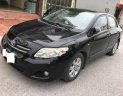 Toyota Corolla altis 1.8G MT 2009 - Bán Toyota Corolla altis 1.8G MT đời 2009, màu đen chính chủ giá cạnh tranh