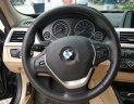 BMW 3 Series 320i 2015 - Bán BMW 3 Series 320i đời 2015, màu đen, xe nhập