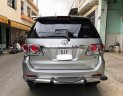 Toyota Fortuner G 2014 - Bán xe Toyota Fortuner G Sx 2014 màu bạc. Xe gia đình sử dụng kỹ đi ít, 1 đời chủ, bảo dưỡng đầy đủ, nước sơn zin 90%