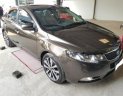 Kia Forte S 1.6 AT 2013 - Bán Kia Forte S 1.6 AT đời 2013, màu nâu số tự động