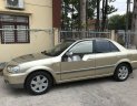 Ford Laser 2003 - Bán Ford Laser năm 2003, màu vàng đồng, giá tốt