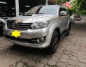 Toyota Fortuner G 2015 - Cần bán xe Toyota Fortuner G sản xuất năm 2015, màu bạc số sàn, giá tốt