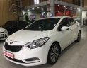 Kia K3 2014 - Cần bán gấp Kia K3 sản xuất 2014, màu trắng số sàn, giá tốt