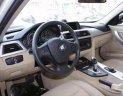 BMW 3 Series 320i 2014 - Cần bán xe BMW 3 Series 320i đời 2014, màu trắng, xe nhập số tự động