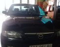 Mazda 626 2004 - Chính chủ bán lại xe Mazda 626 sản xuất năm 2004, màu đen, nhập khẩu