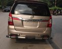 Toyota Innova E 2013 - Bán ô tô Toyota Innova E sản xuất năm 2013, màu vàng số sàn