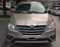 Toyota Innova E 2013 - Bán ô tô Toyota Innova E sản xuất năm 2013, màu vàng số sàn