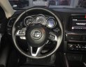 Mazda CX 5 2.0AT 2016 - Cần bán gấp Mazda CX 5 2.0AT sản xuất năm 2016, màu trắng số tự động