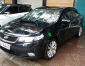 Kia Forte SLi 1.6 AT 2010 - Bán Kia Forte SLI 2010, màu đen, xe nhập chính chủ