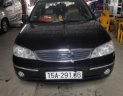 Ford Laser 2004 - Cần bán Ford Laser năm sản xuất 2004, màu đen số tự động