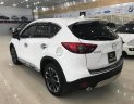 Mazda CX 5 2.0AT 2016 - Cần bán gấp Mazda CX 5 2.0AT sản xuất năm 2016, màu trắng số tự động