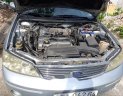 Ford Laser   2004 - Cần bán Ford Laser sản xuất năm 2004, màu bạc xe gia đình, giá 185tr