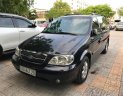 Kia Carnival GS 2.5 AT 2009 - Bán Kia Carnival GS 2.5 AT sản xuất 2009, màu đen