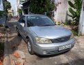 Ford Laser   2004 - Cần bán Ford Laser sản xuất năm 2004, màu bạc xe gia đình, giá 185tr