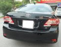 Toyota Corolla XLI 1.6 2011 - Cần bán lại xe Toyota Corolla XLI 1.6 năm 2011, màu đen, nhập khẩu chính chủ, 550tr