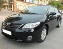 Toyota Corolla XLI 1.6 2011 - Cần bán lại xe Toyota Corolla XLI 1.6 năm 2011, màu đen, nhập khẩu chính chủ, 550tr