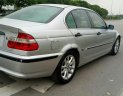 BMW 3 Series 318i AT 2004 - Cần bán lại xe BMW 3 Series 318i AT năm sản xuất 2004, màu bạc 