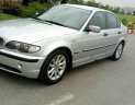 BMW 3 Series 318i AT 2004 - Cần bán lại xe BMW 3 Series 318i AT năm sản xuất 2004, màu bạc 