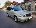 Kia Carnival GS 2.5 AT 2009 - Bán Kia Carnival GS 2.5 AT năm sản xuất 2009, màu vàng cát