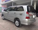 Toyota Innova 2.0E 2014 - Bán ô tô Toyota Innova 2.0E đời 2014, màu bạc số sàn, 570 triệu