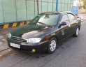 Kia Spectra 1.6MT 2004 - Bán Kia Spectra 1.6MT sản xuất năm 2004, màu đen  