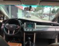 Toyota Innova 2.0E 2016 - Cần bán gấp Toyota Innova 2.0E năm 2016, màu nâu, 699 triệu