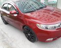 Kia Forte SX 1.6 AT 2011 - Cần bán xe Kia Forte SX 1.6 AT sản xuất năm 2011, màu đỏ còn mới, giá tốt