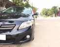 Toyota Corolla altis 1.8G MT 2009 - Bán ô tô Toyota Corolla altis 1.8G MT năm 2009, màu đen