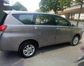 Toyota Innova E 2016 - Cần bán lại xe Toyota Innova E đời 2016, màu bạc chính chủ giá cạnh tranh