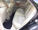 Toyota Corolla altis 1.8G MT 2009 - Bán ô tô Toyota Corolla altis 1.8G MT năm 2009, màu đen