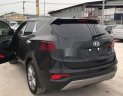Hyundai Santa Fe 2016 - Cần bán Hyundai Santa Fe đời 2016, màu đen, giá tốt