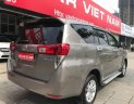 Toyota Innova 2.0E 2016 - Cần bán gấp Toyota Innova 2.0E năm 2016, màu nâu, 699 triệu
