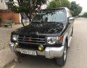 Mitsubishi Pajero 2004 - Cần bán Mitsubishi Pajero đời 2004, màu đen số sàn